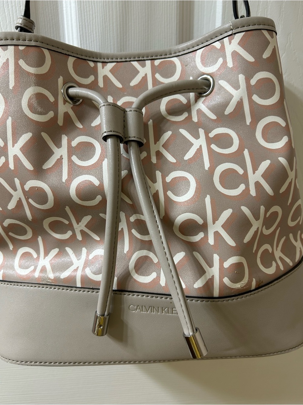 Calvin Klein Pink Logo Drawstring Shoulder Bag with Taupe Trim